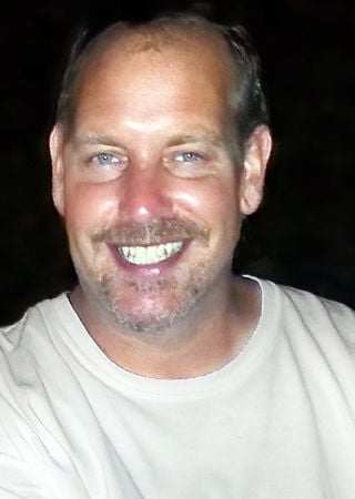 Mark A. Scott