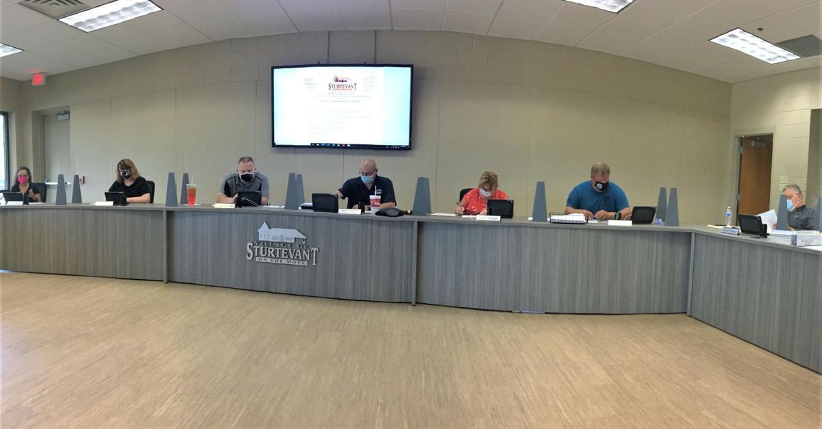 Sturtevant to prohibit motor vehicle parking in side, rear yards