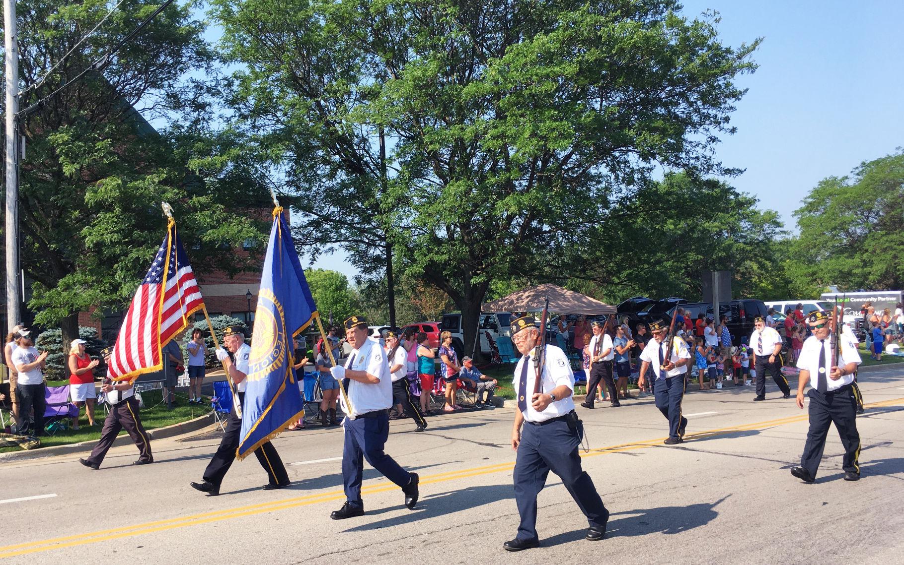 Color guard parades in formation for Fourth of July celebration in Union Grove
