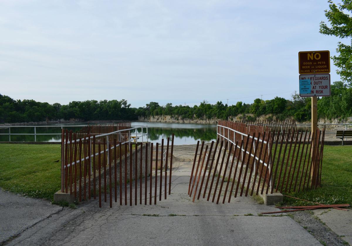 Quarry Lake closed, partially drained for beach restoration Local