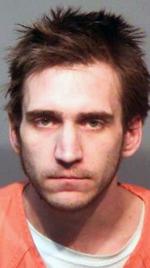 Portage man accused of pointing gun at woman in hit-and-run | Local