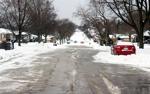 Perry Avenue gets covered in snow