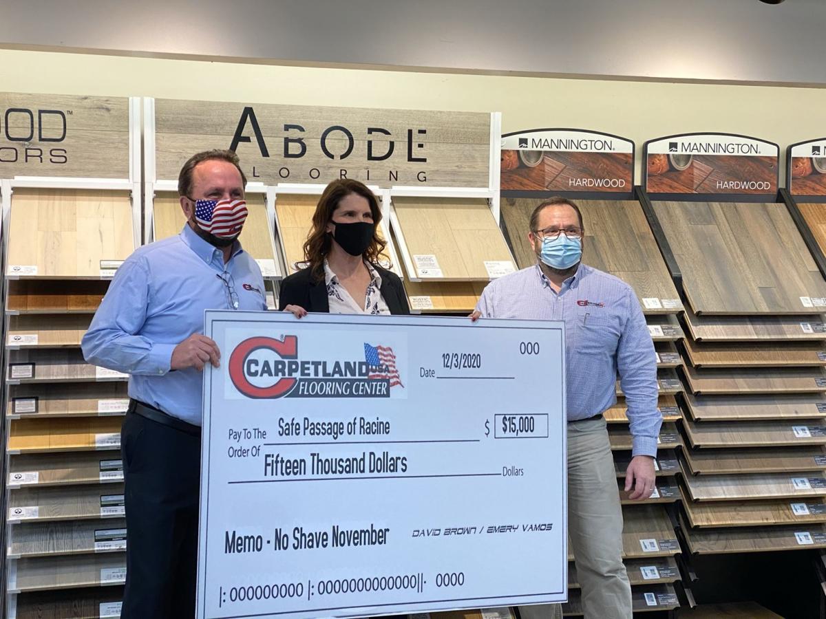 Carpetland Usa Raises 60 000 For Area Charities Including Racine Ymca Safe Passage Local News Journaltimes Com