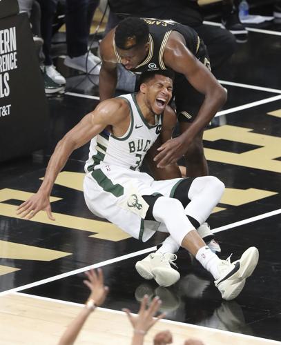 Hawks romp to Game 4 win without Young, Giannis goes down