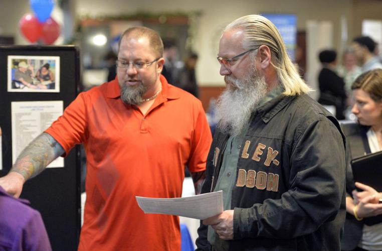 Spring job fair draws 70 employers and applicants of all ages