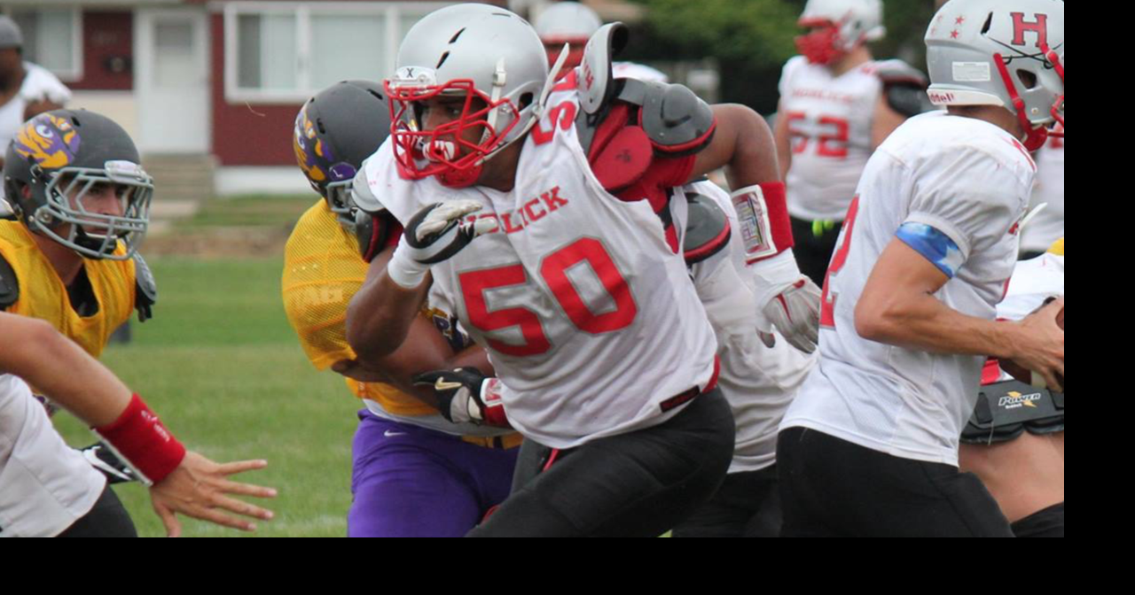 With new football helmets, group aims to prevent concussions