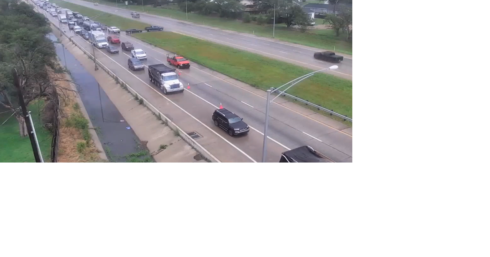 Thunderstorm Downed Power Lines Shut Down I-235 in Wichita, Leaving Traffic Stalled & Homes Without Power