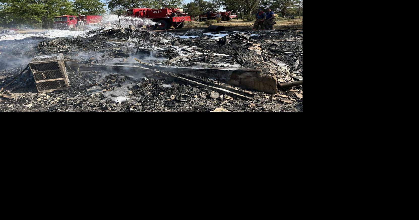 Several departments respond to multi-structure fire in Milan, fire district says