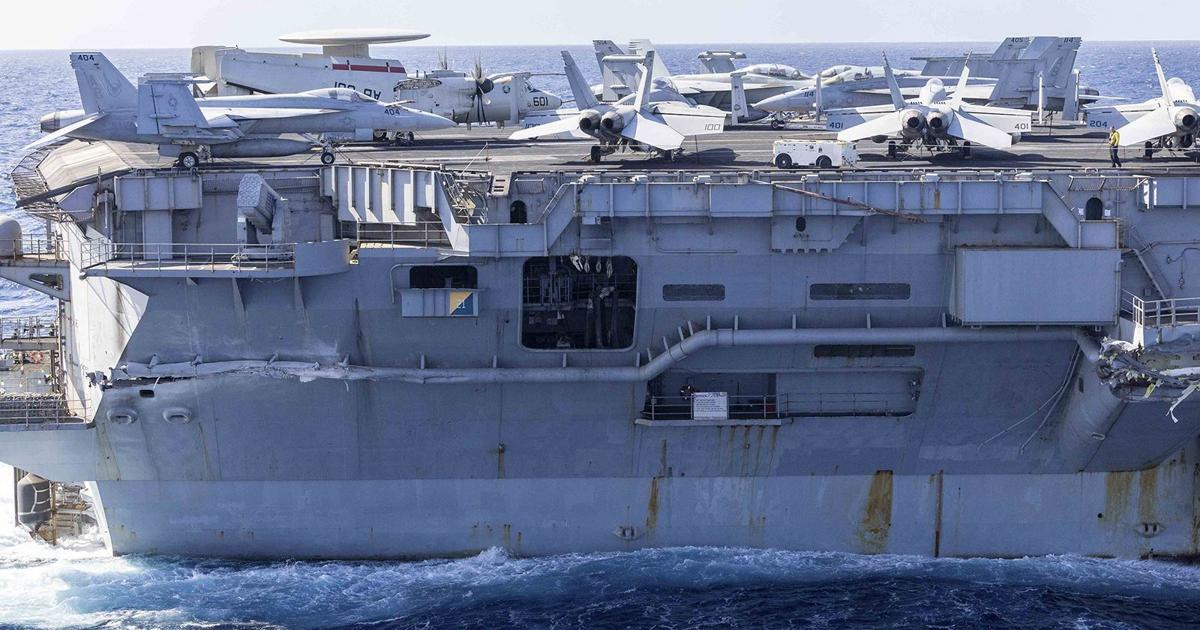 Damaged Jet New photos show damage to US aircraft carrier after collision ...