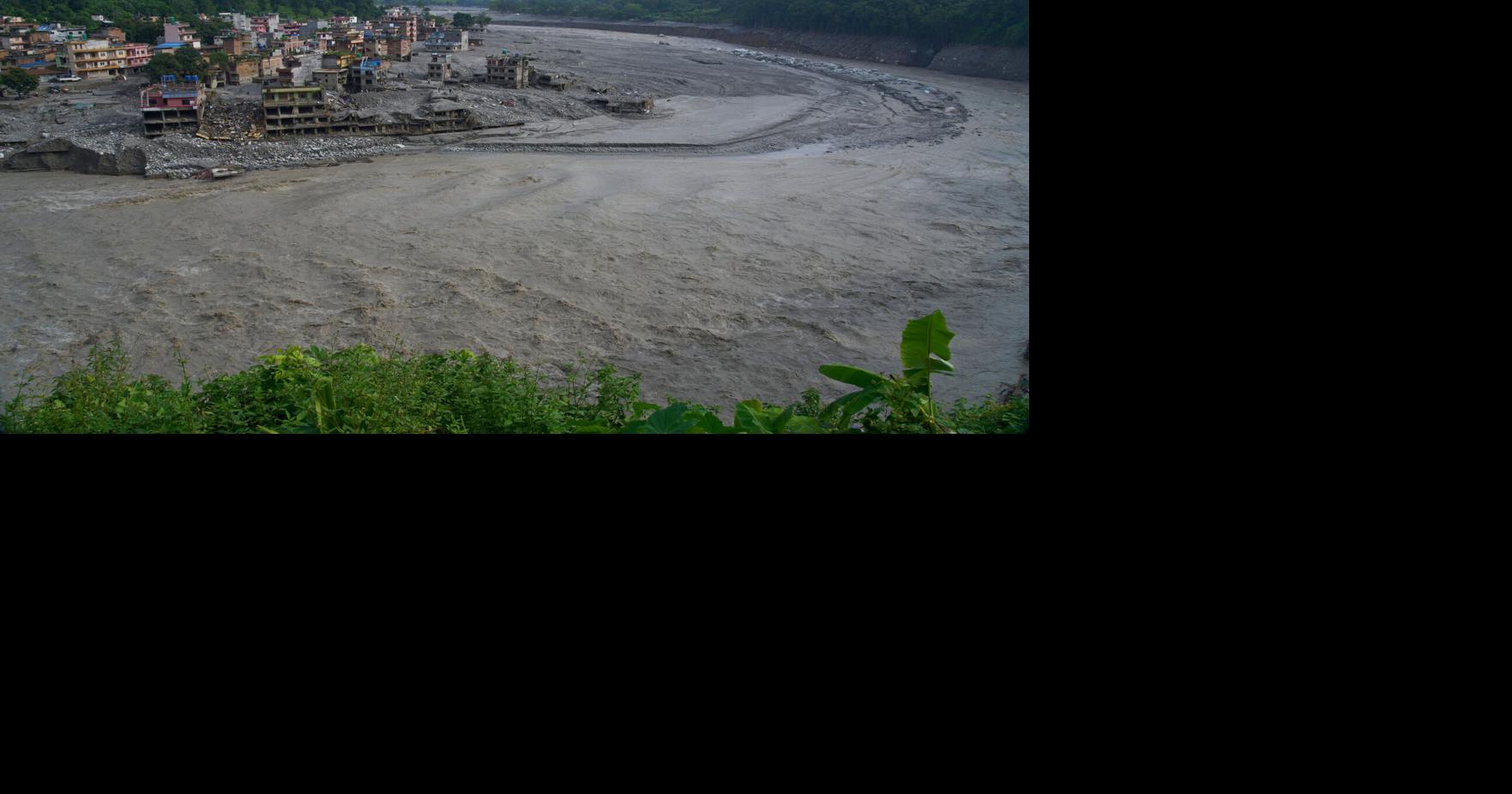 Nepal holds a day of mourning after floods kill at least 1,300 people ...