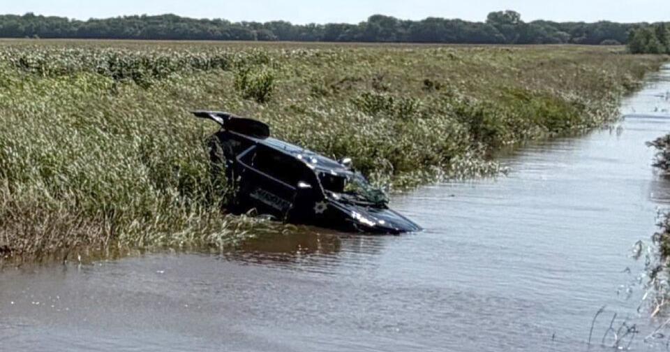 Human chain formed to rescue Kansas deputy after patrol vehicle becomes submerged in floodwaters