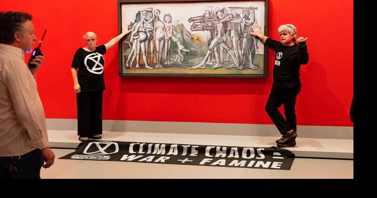 Extinction Rebellion activists glue themselves to Picasso painting ...