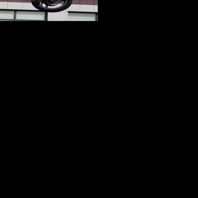 Motorcycle left dangling from traffic light after crash | Video | kake.com