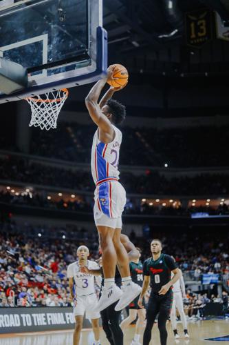 NCAA vs howard- KJ DUNK!