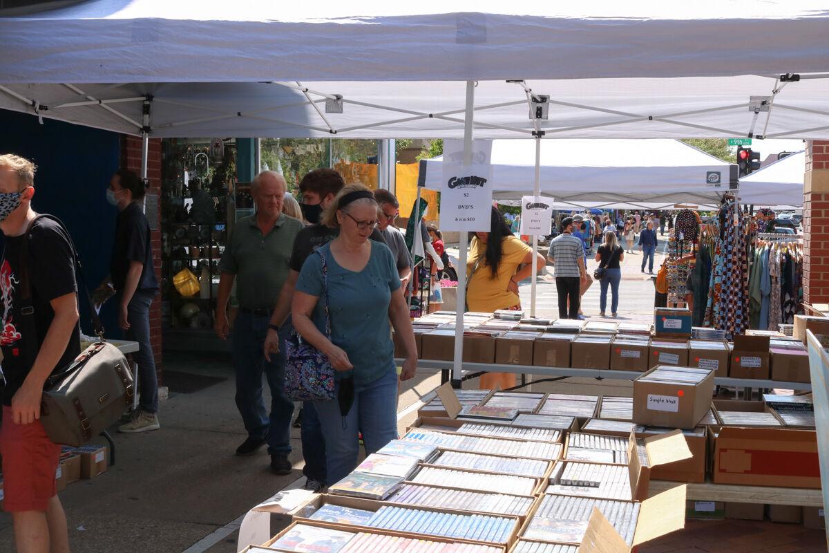 Local shops occupy Mass Street sidewalks for annual sale event | Arts &  Culture | kansan.com