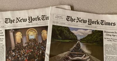 Copies of the New York Times on a desk