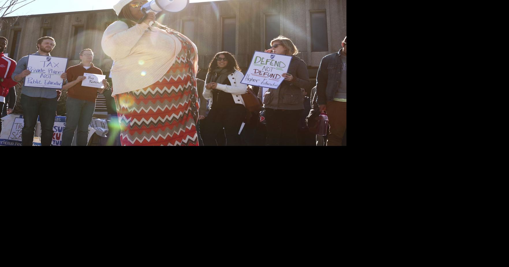 KU graduate students stage 'walk out' to protest impending tax bill ...