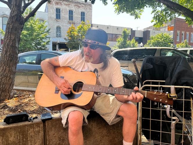 How do musicians make money in Lawrence? Arts & Culture