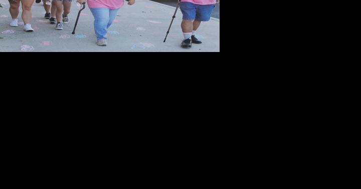 Sidewalks packed with pink for 'Walk a Mile in Their Shoes' | Features - Vimarsana News