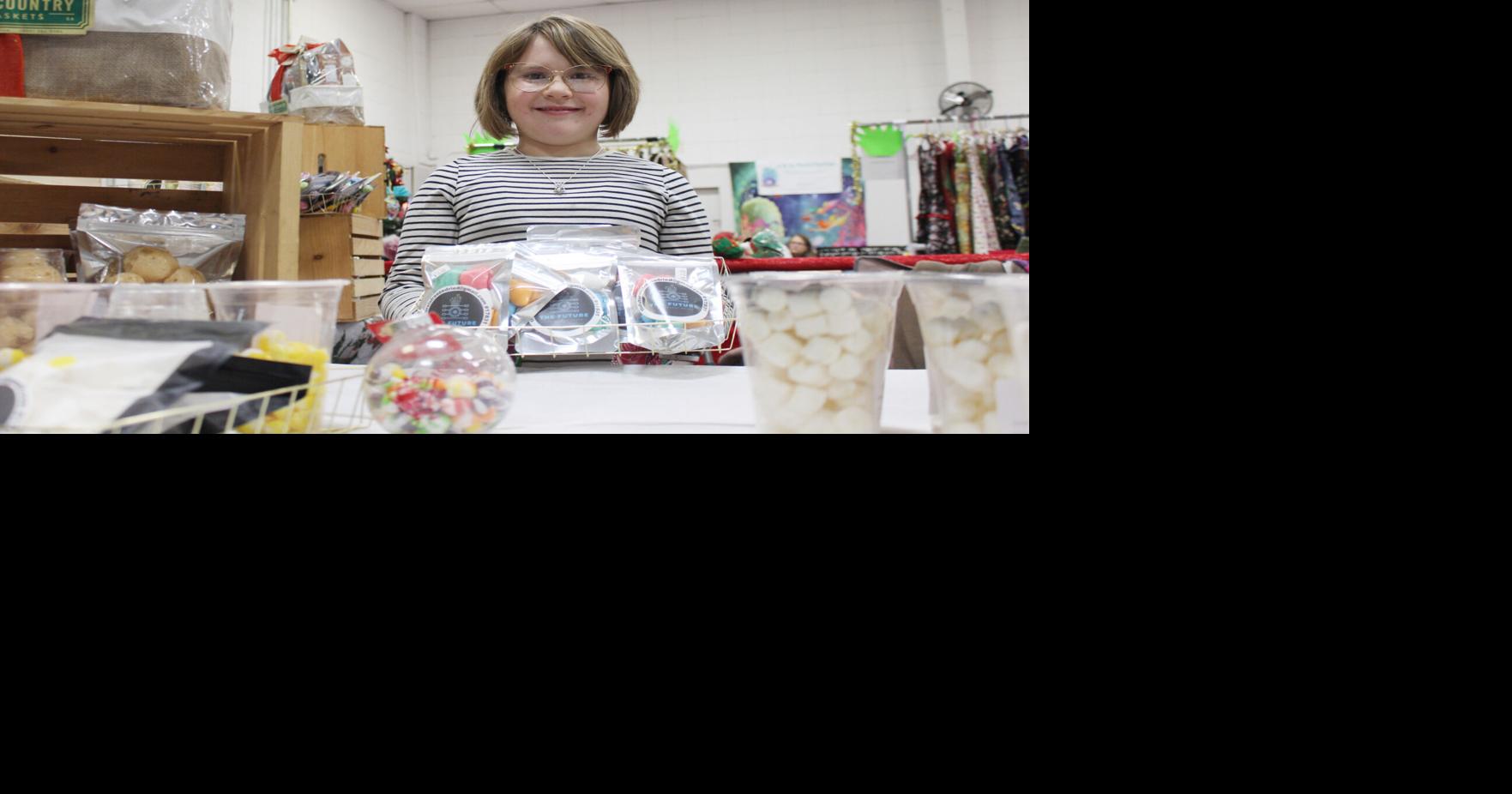 Businessgirl wins over Kingman market Features