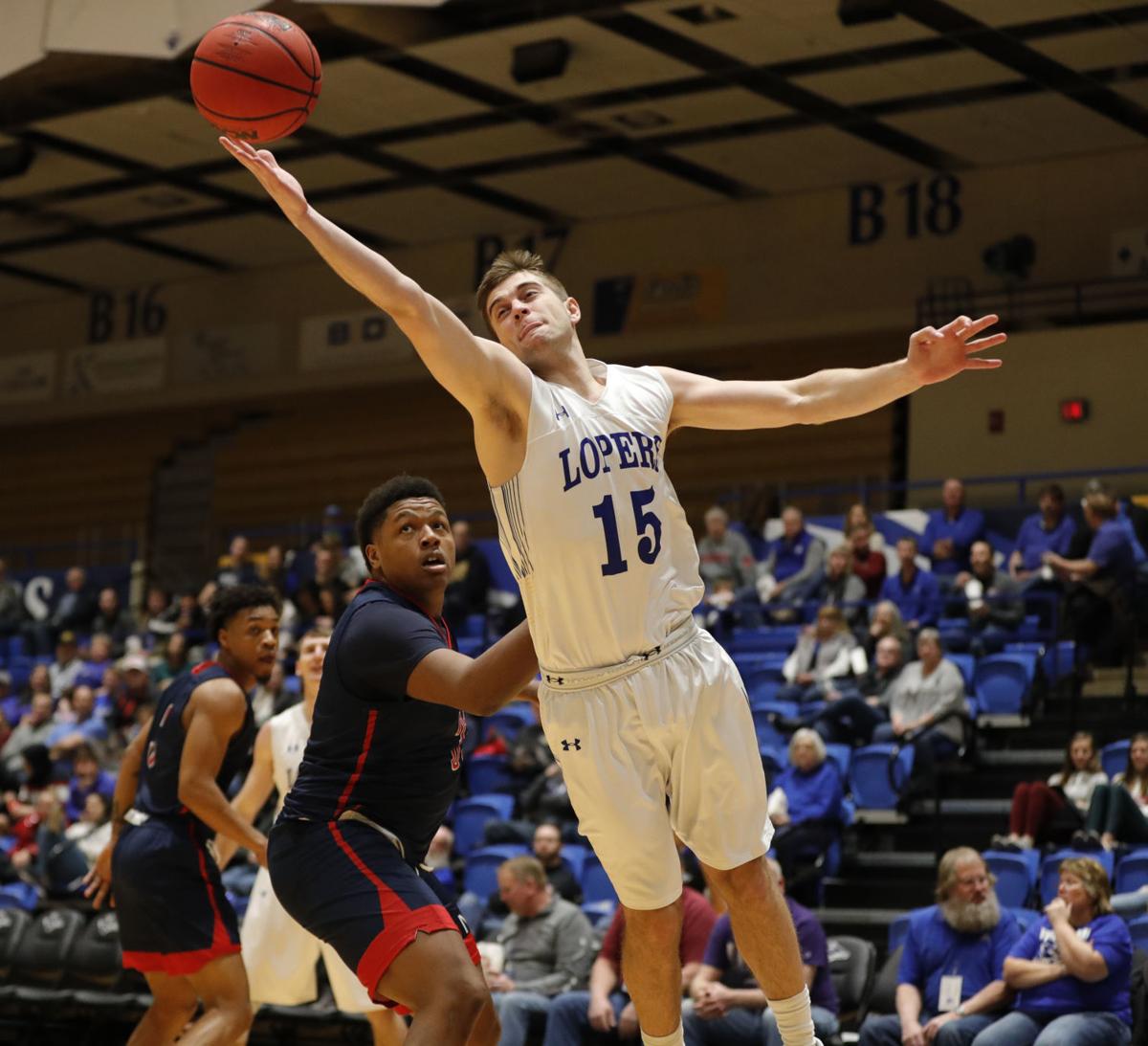 Photos Unk Vs Newman Mens Basketball Gallery Kearneyhub Com