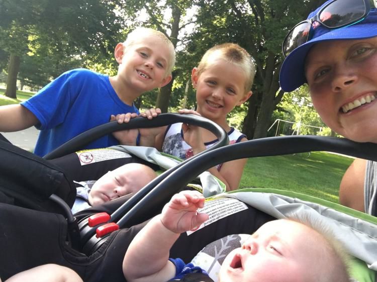 Nebraska woman juggles two sets of twins teaching and training for