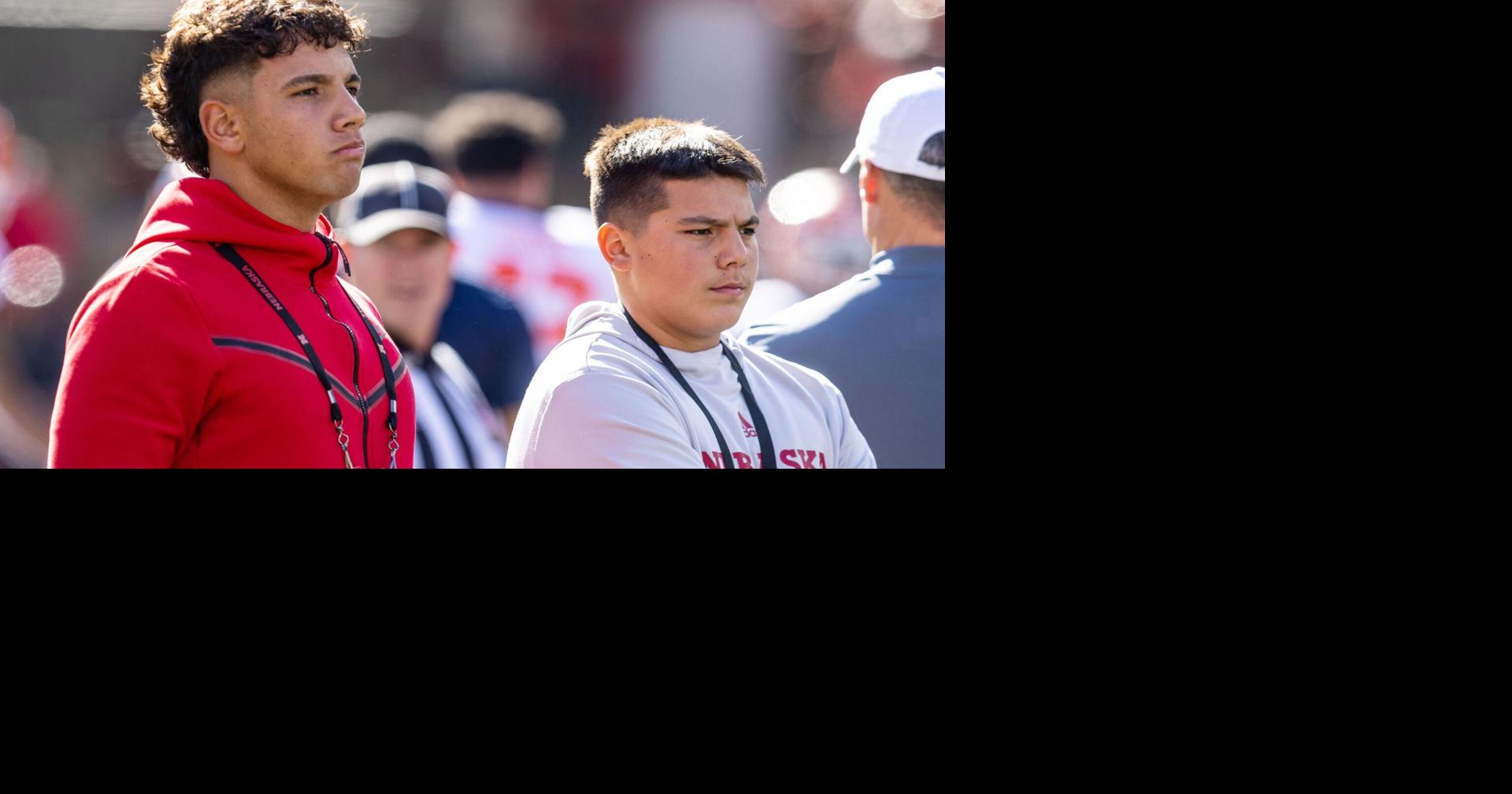 Recruiting Dylan and Dayton Raiola on sidelines for Nebraska vs. Illinois
