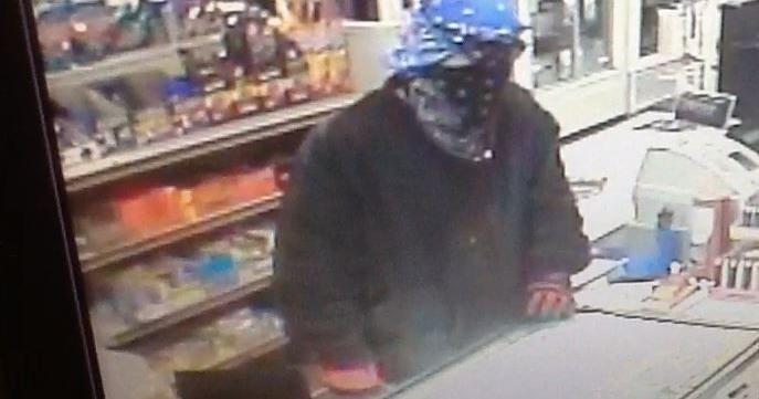 Lexington man charged in liquor store armed robbery