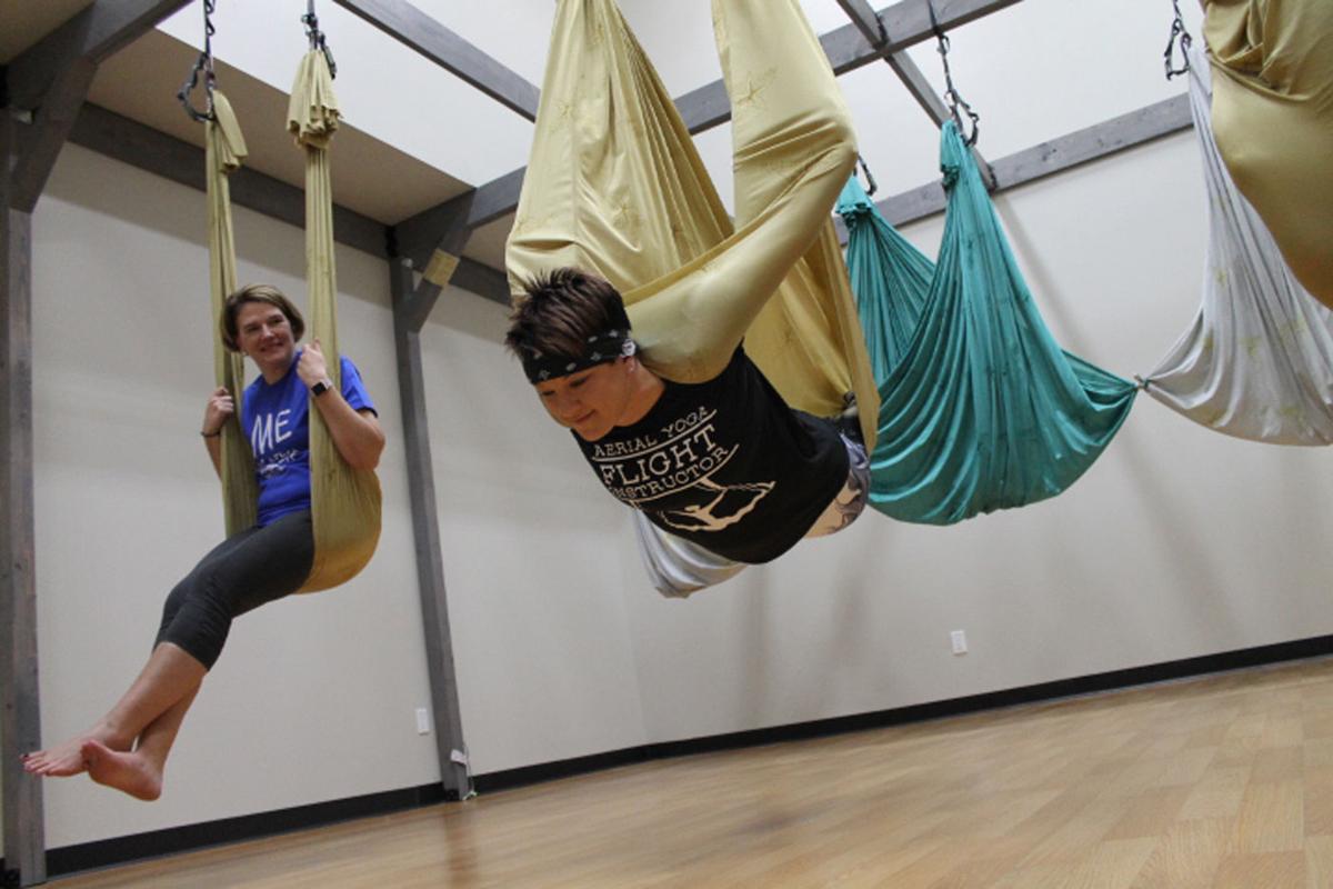 Aerial Yoga combines aerobics, yoga and silk hammocks at K-Town