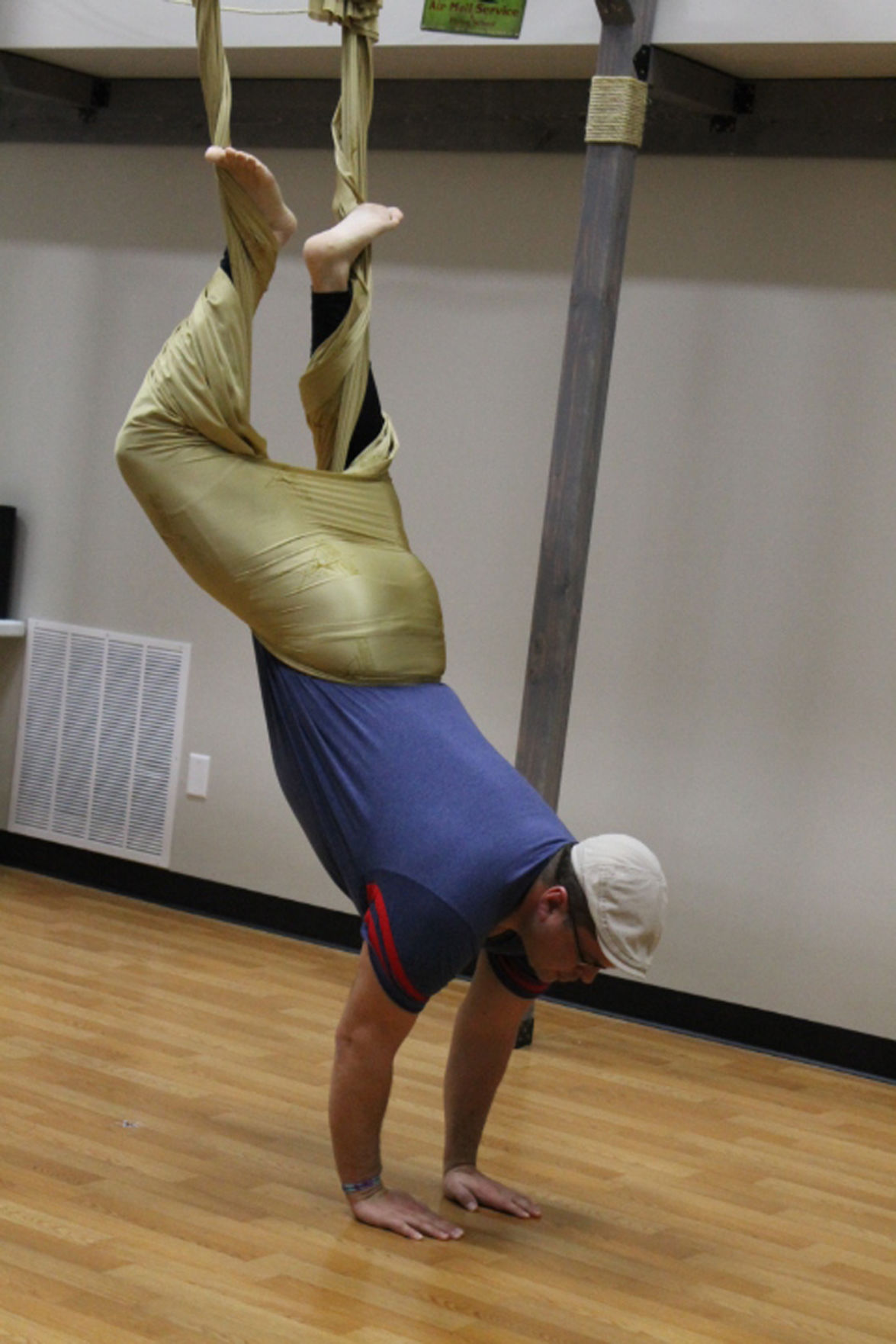 Aerial Yoga combines aerobics, yoga and silk hammocks at K-Town