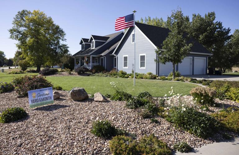 Kearney award winner works on her lawn about 6 hours per day