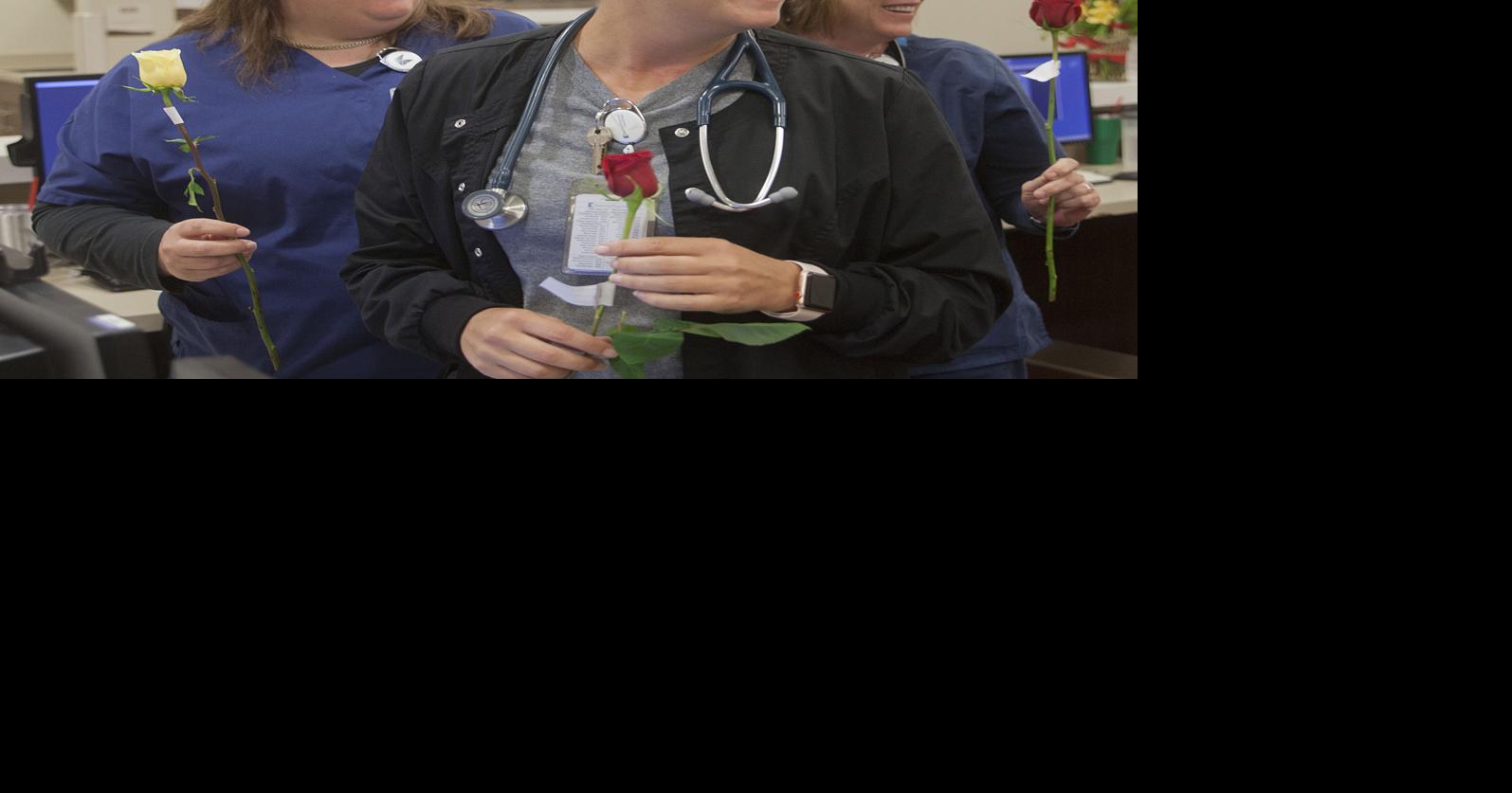 Hy-Vee floral team delivers 1,200 roses to hospital patients