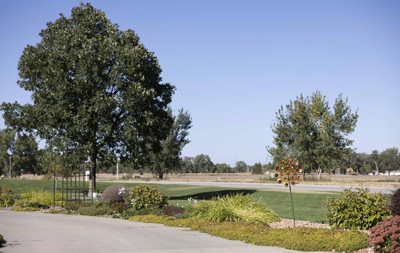 Kearney award winner works on her lawn about 6 hours per day