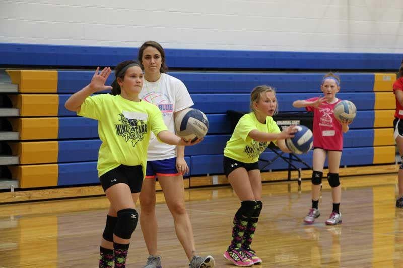 Girls learn volleyball skills, gain self-esteem at volleyball academy ...