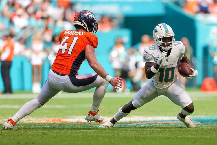 Raheem Mostert reacts to Dolphins' historic 70-point explosion