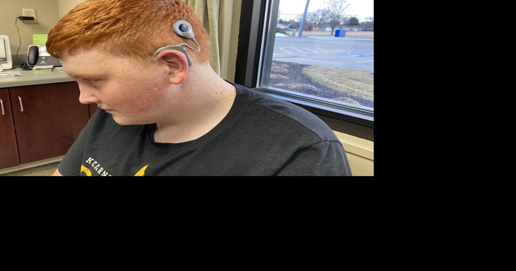 Cochlear implant lets Kearney Catholic football player hear again