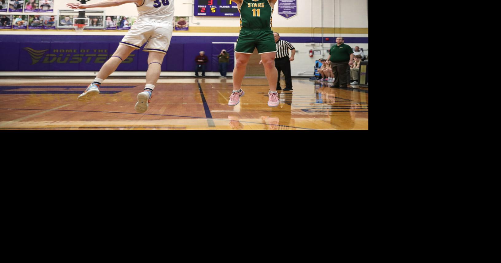 kearneycatholicboysbasketballholdrege