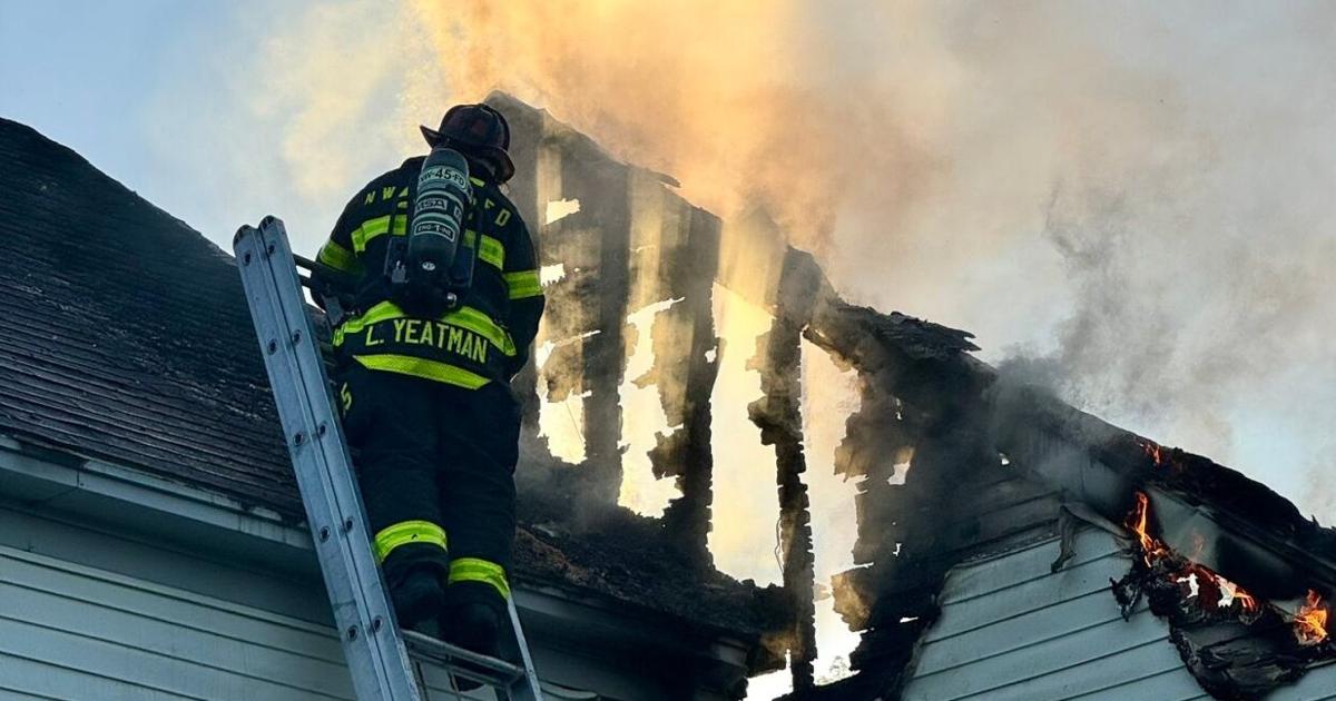 Fire destroys garage, damages home