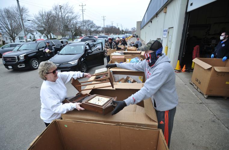 A chance to donate unwanted household goods creates a traffic jam