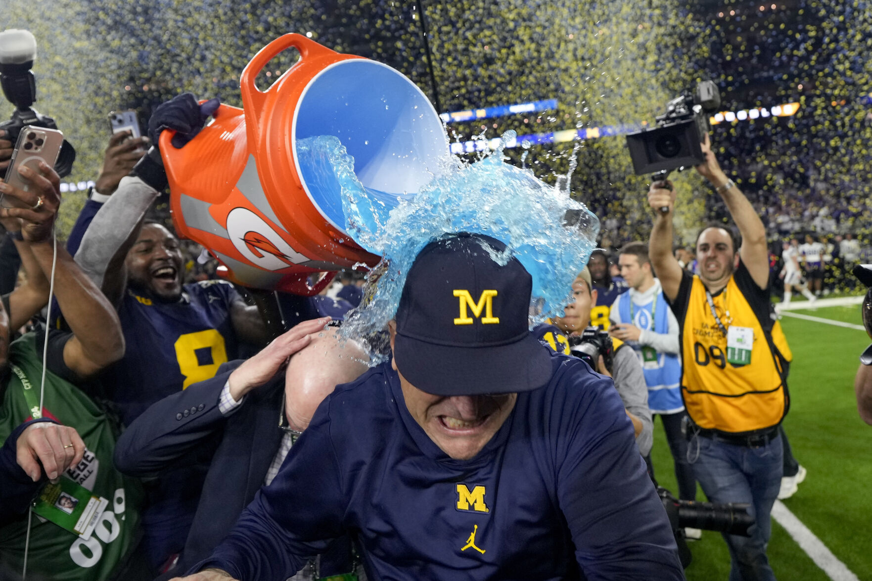 Corum scores 2 TDs and Harbaugh delivers a national title to