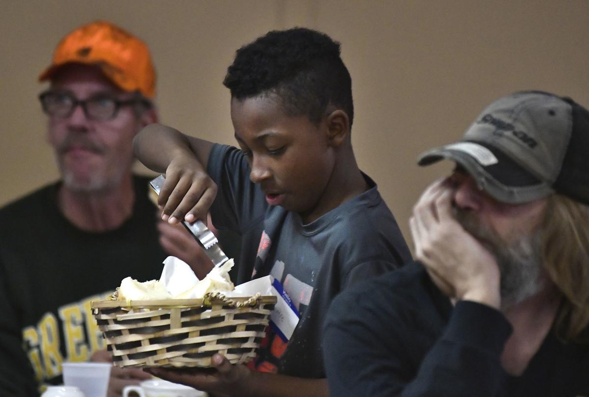"Giant family" gathers for Thanksgiving meal at First ...
