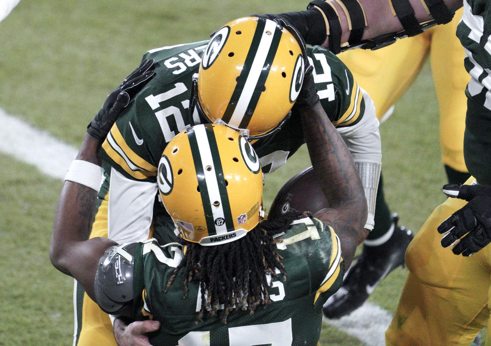 Photos: Aaron Rodgers reaches career milestone as Packers hold off Eagles