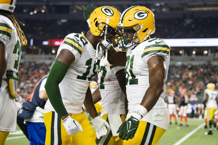 AJ Dillon uses 'dad strength' to take over run game, propel Packers