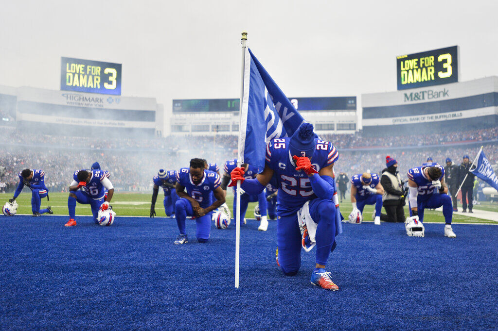 Cincinnati Bengals wide receiver Tyler Boyd (83) warms up in a Damar Hamlin  jersey in support of the Buffalo Bills safety during pregame before an NFL  football game against the Baltimore Ravens