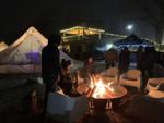 With the cold February temperatures people stay warm by one of the bonfires