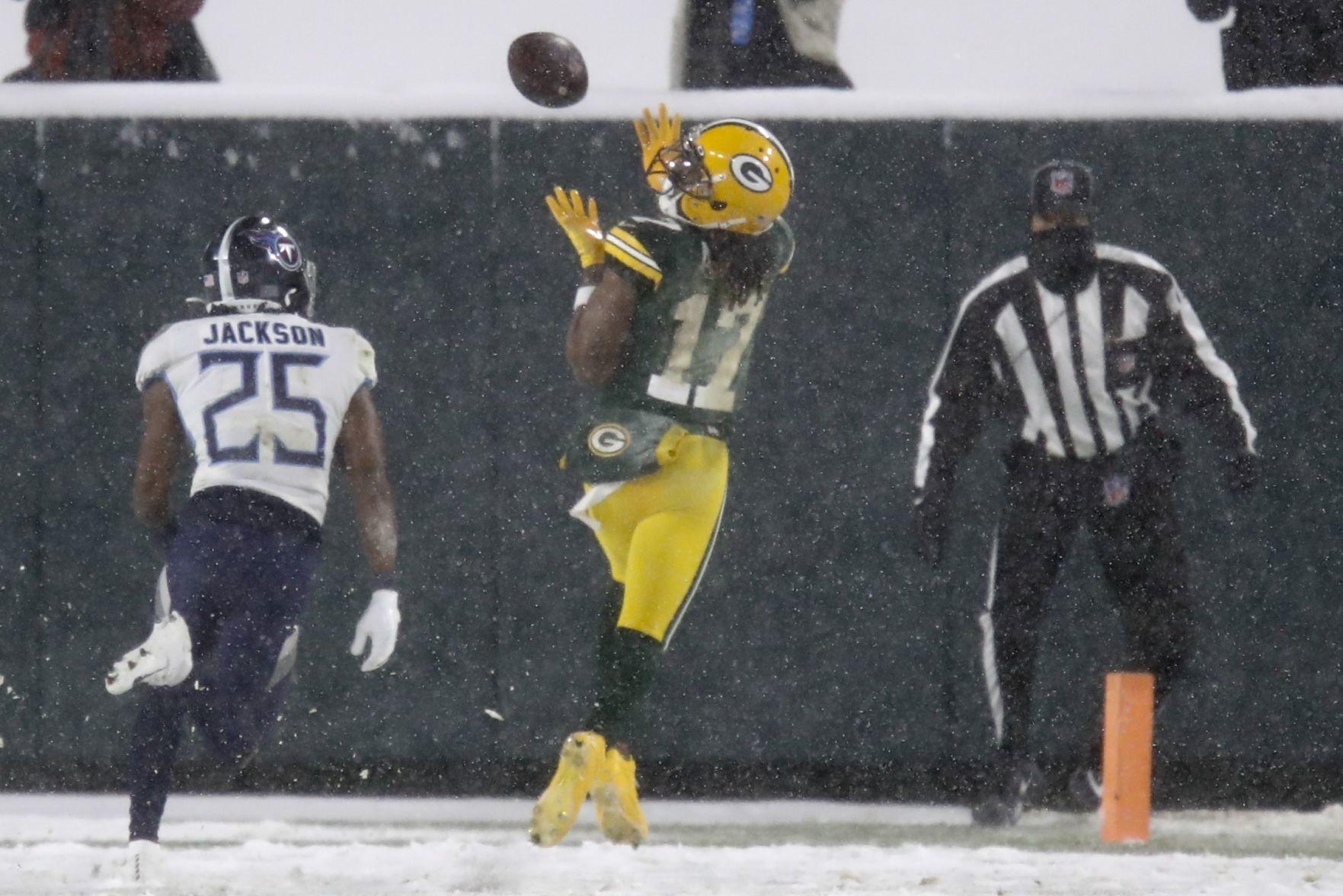 Photos: Green Bay Packers crush Tennessee Titans at snowy Lambeau Field