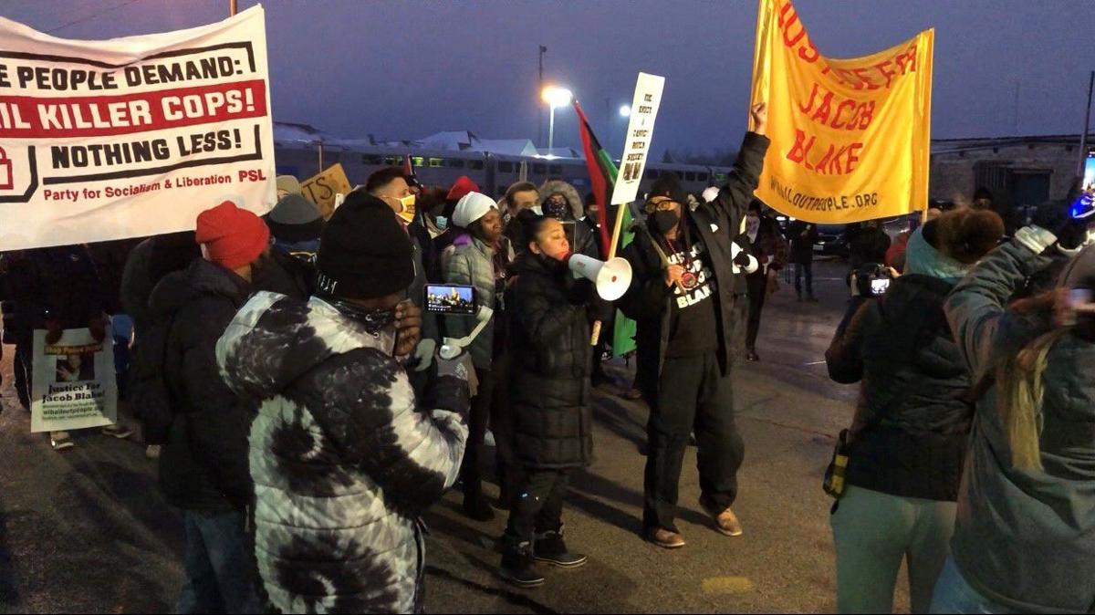 Blake family, supporters march in advance of D.A.'s announcement