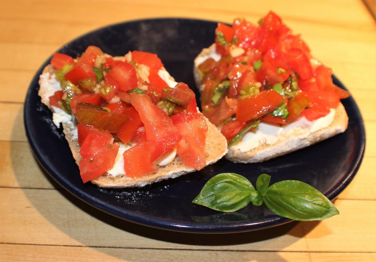 this bruschetta is topped with fresh garden tomatoes combined with garlic olive oil and basil - Olive Garden Kenosha this bruschetta is topped with fresh garden tomatoes combined with garlic olive oil and basil - Olive Garden Kenosha