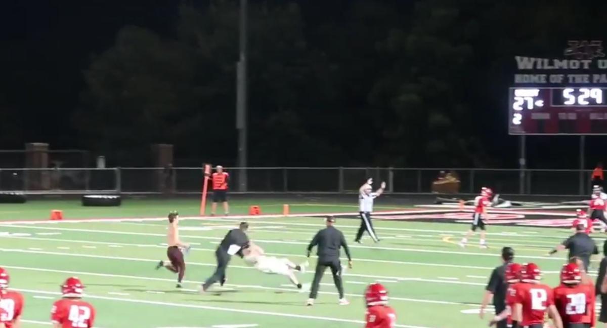 Coach tackles students on Wilmot football field