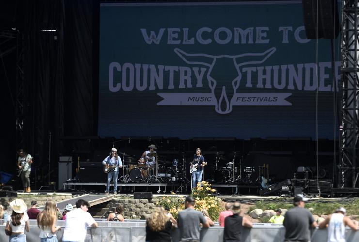 Crowds surge Friday at Country Thunder Wisconsin musical festival Crowds surge Friday at Country Thunder Wisconsin musical festival